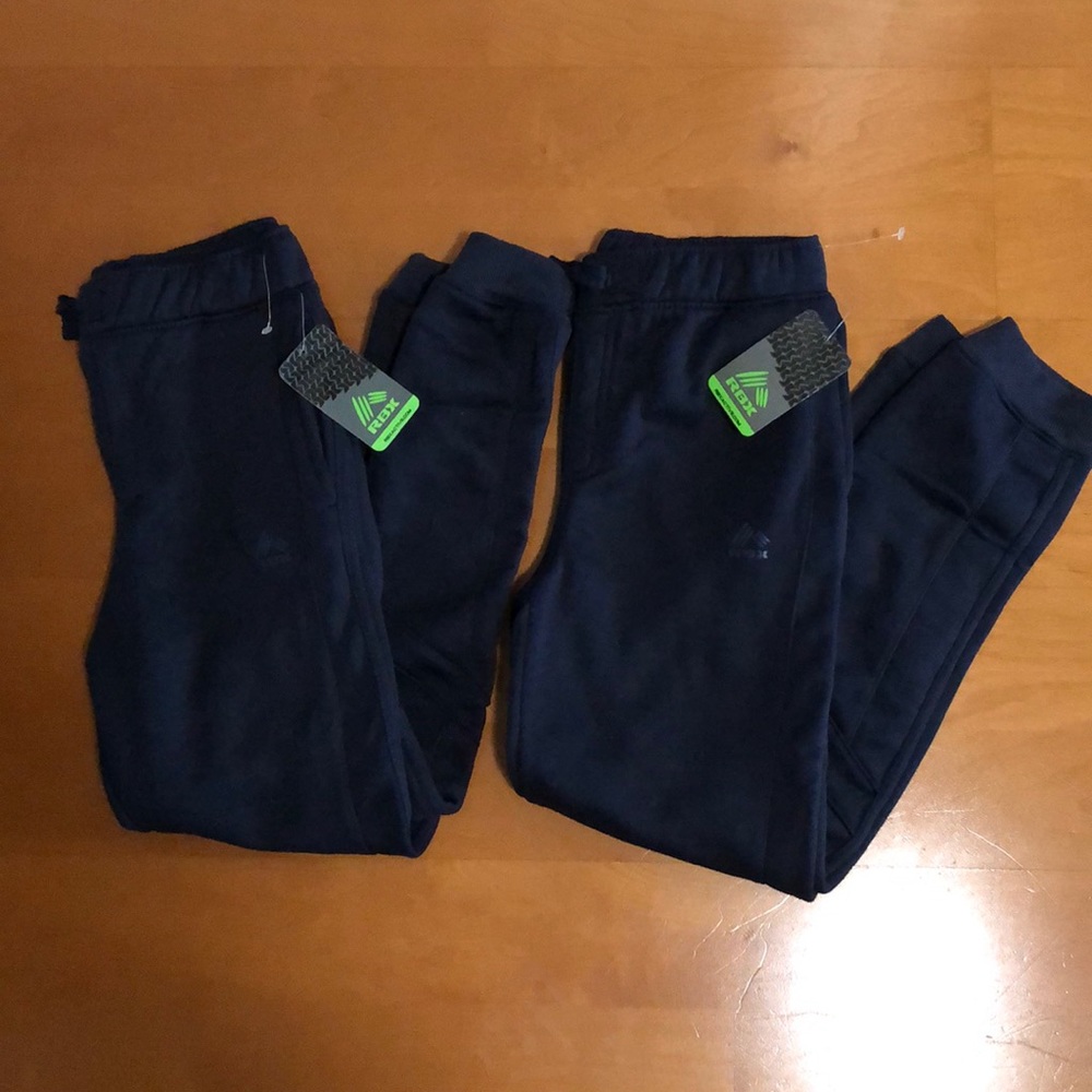 Two pairs of NWT youth M RBX Active navy joggers
